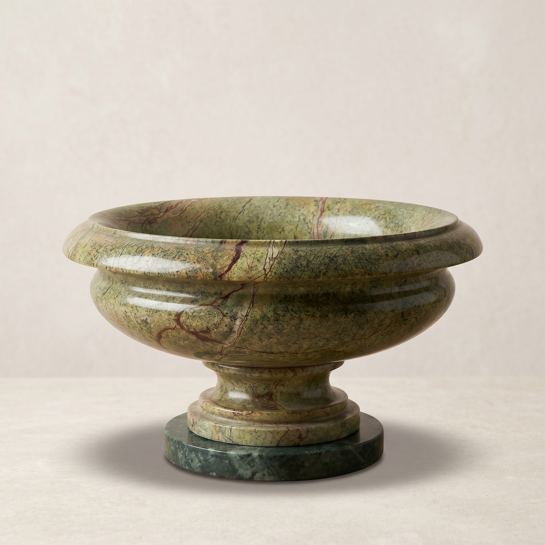 Green marble bowl on a beige background